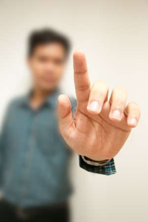 business man hand touch virtual screenの写真素材