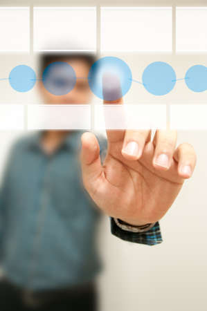 business man hand touch virtual screenの写真素材