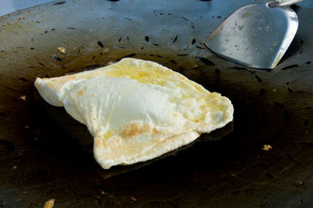 business man make indian food gourmet Southern Flat Bread Fry Pan roteeの写真素材