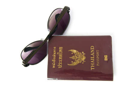 Thailand Passports and Sunglasses  for  travel at Thailand