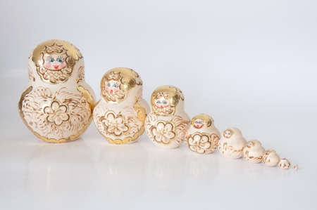 Matryoshka, a Russian wooden doll on a white backgroundの写真素材