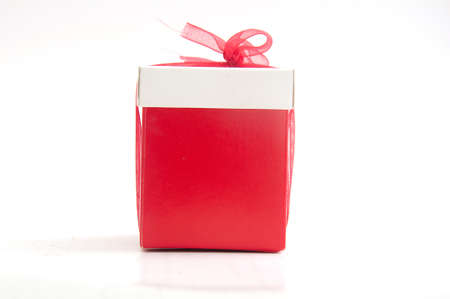 gift box with ribbon isolated on whiteの写真素材