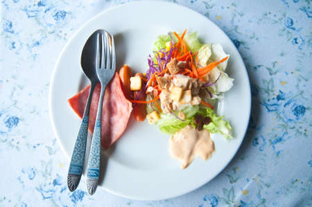 Fresh vegetable salad on tableの写真素材