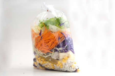 vegetable salad in plastic bagの写真素材