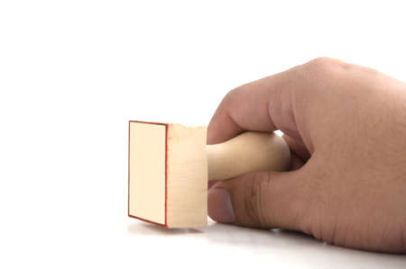 Rubber stamper with the word in handの写真素材