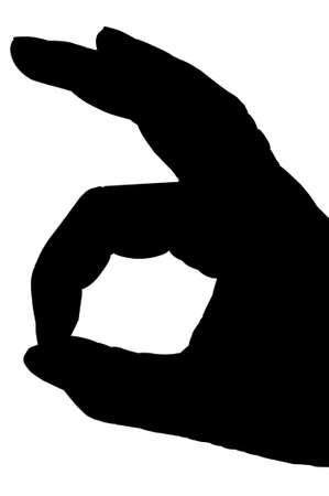 black hand showing OK sign.の写真素材