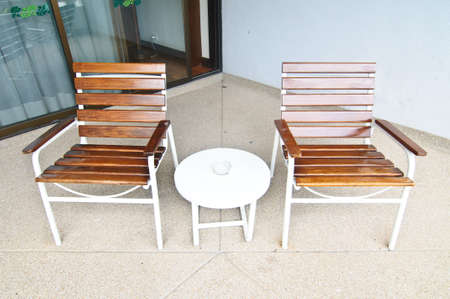Wooden table and chair set in resortの写真素材