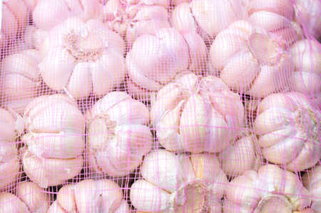 close up of garlic on market stand