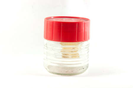 Glass clear empty jam jar with red lidの写真素材