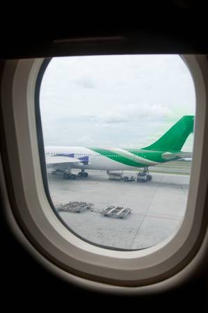 Commercial passenger aircraft, ready for boarding on the landing strip of an airportのeditorial素材