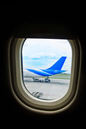 Commercial passenger aircraft, ready for boarding on the landing strip of an airportのeditorial素材