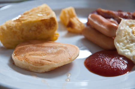 Breakfast - toasts, eggs, bacon,hotdog
