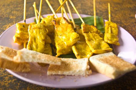 Grilled Pork Satay with Peanut Sauce and Vinegarの写真素材