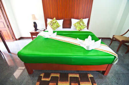 Beautiful double bed in traditional Thai settingのeditorial素材