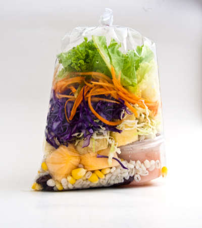 vegetable salad in plastic bagの写真素材