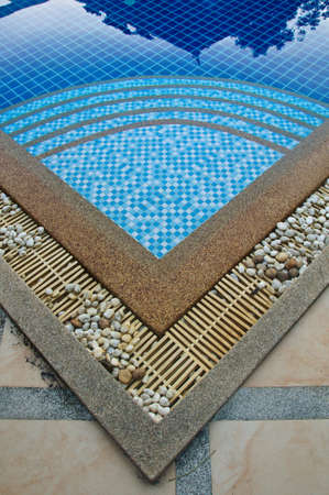 swimming pool blue water detail in summer timeの写真素材