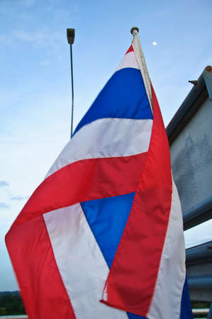 Thailand flag on blue sky and cloudy background