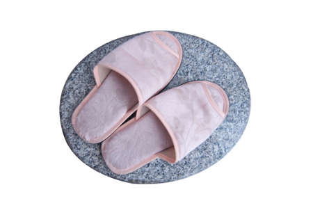 pink slipper on white backgroundの写真素材