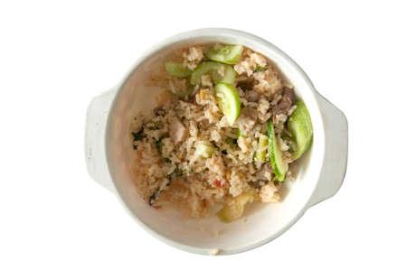 Fried rice with pork on white dishの写真素材