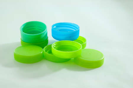 green and blueplastic bottle screw caps used to seal plastic bottlesの写真素材