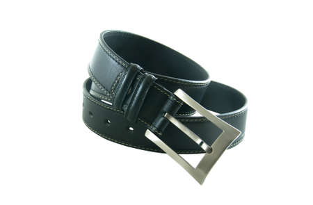 dark brown leather belt isolated on whiteの写真素材