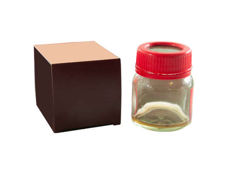 empty glass container and box red on white backgroundの写真素材