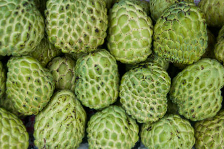 Custard apple background for sale at a marketの写真素材