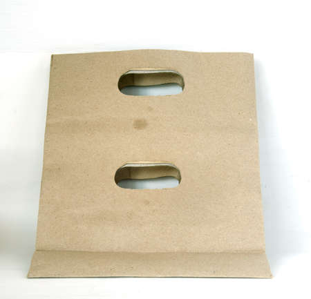 Recycled Shopping paper bag isolated on white backgroundの写真素材