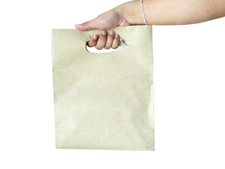 female hand holding a shopping bagの写真素材