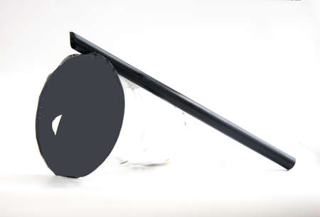 back dark cups with a back straws  Isolated on a whiteの写真素材