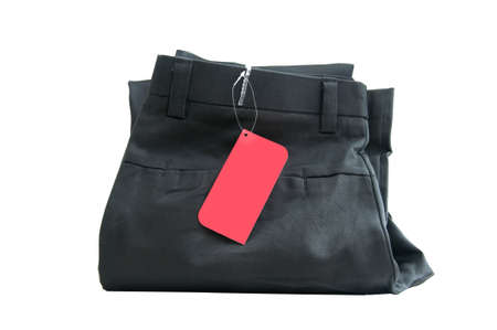 New black trousers with red tagging on whiteの写真素材