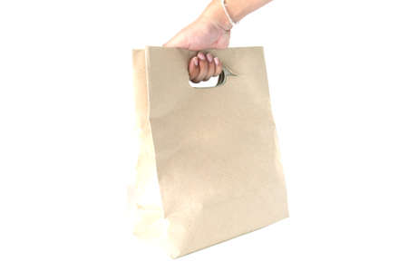 man hand holding a shopping bagの写真素材