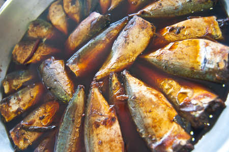 Mackerel soak in syrup,local food of Thailandの写真素材