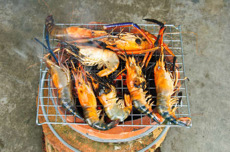 Cooking tiger prawns grilled. Close-up. Background. Outdoor.の写真素材