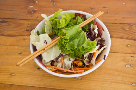 Fresh salad on table woodの写真素材