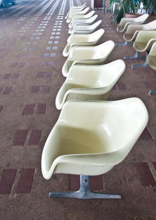 a row of seats inside railway waiting roomの写真素材