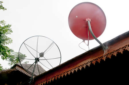 Satellite dish on roofの写真素材