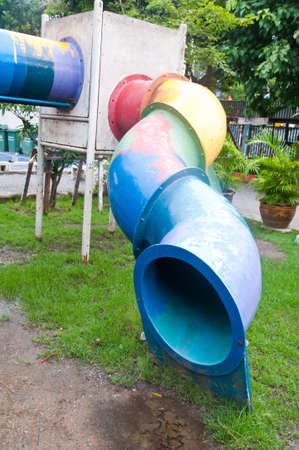 Old children playground in parkの写真素材