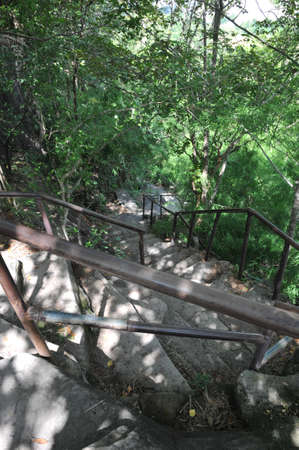 The walk ladder down to the mountainの写真素材