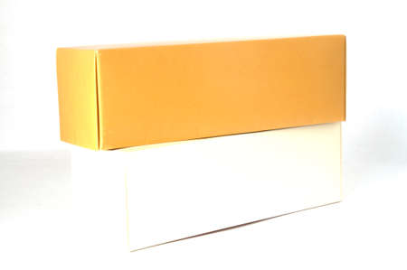 gold  cardboard box isolated on a white backgroundの写真素材