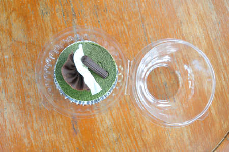 Green tea cake on wood table