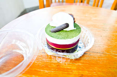 Delicious cake! Fresh and healthy! green tea on woodの写真素材