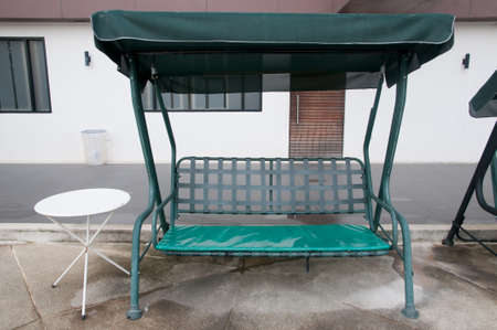 Chaise in swimming pool, Thailandの写真素材