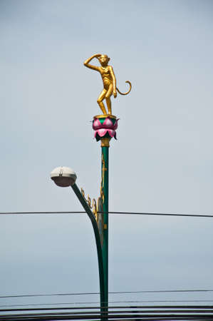 lamp post,monkey at Thailandの写真素材