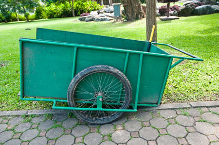 Gardening season - green- wheelbarrowの写真素材