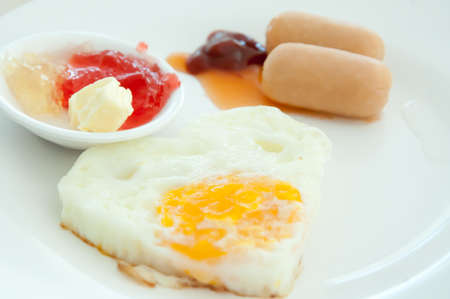 Breakfast - toasts, egg, sausageの写真素材