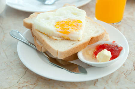 Fried eggs with toastsの写真素材