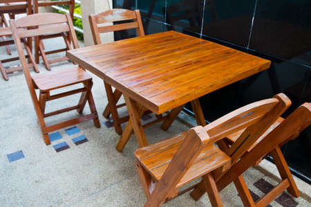 Wooden dining tables outdoorの写真素材