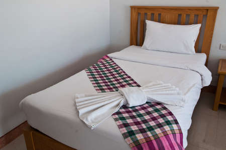Modern, warm, inviting bedroom or hotel room-loinclothの写真素材