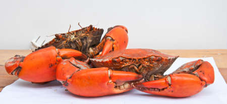 Two big boiled crab on wood tableの写真素材